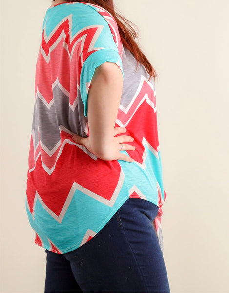 Plus coral and ice blue chevron print top with front tie hem