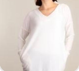 Ivory pocketed tunic with choker neck