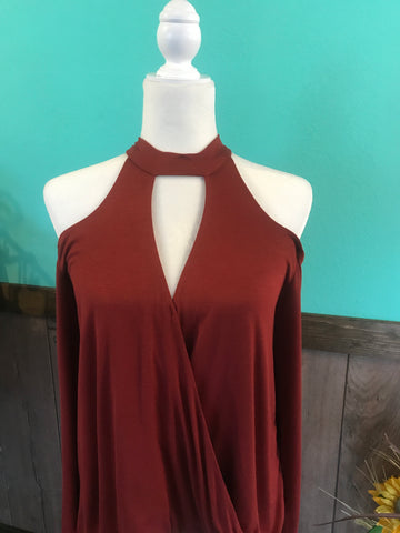 Cold shoulder high neck top in spicy rust