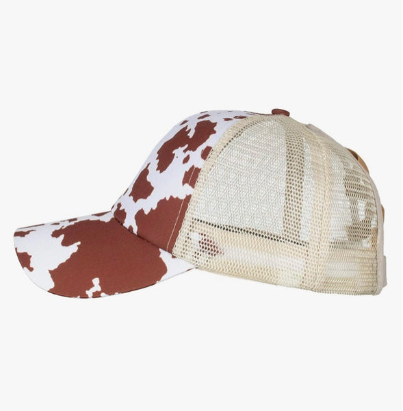 Cow print ponytail trucker hat