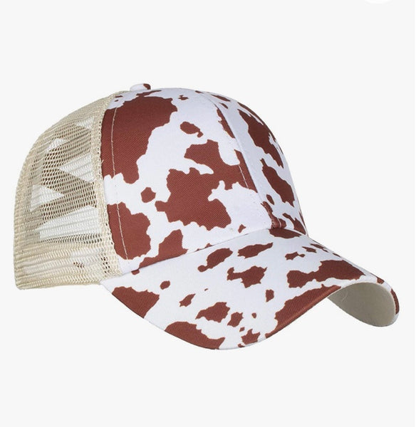 Cow print ponytail trucker hat